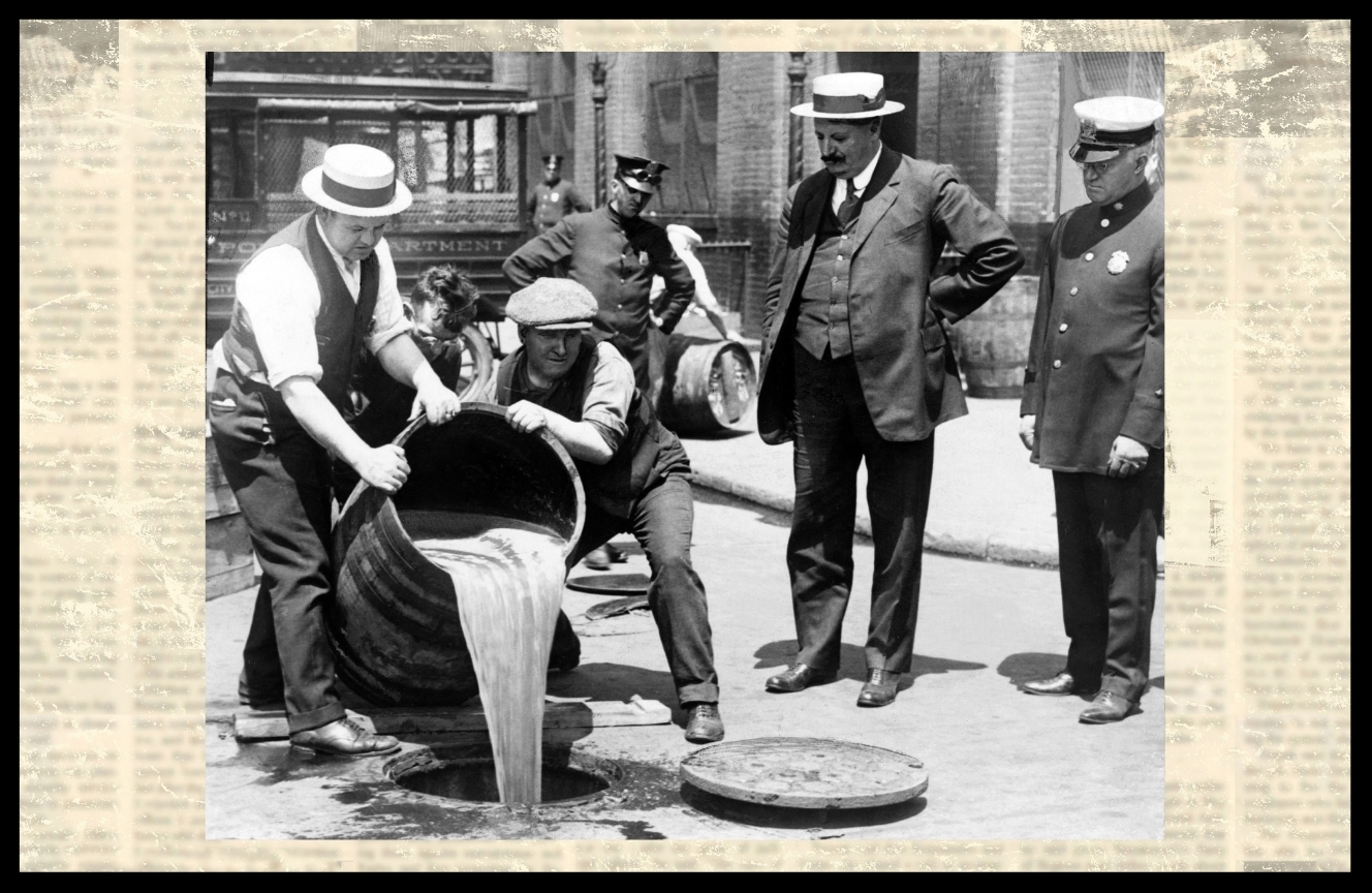 Police pour out alcohol in the 1920s during Prohibition