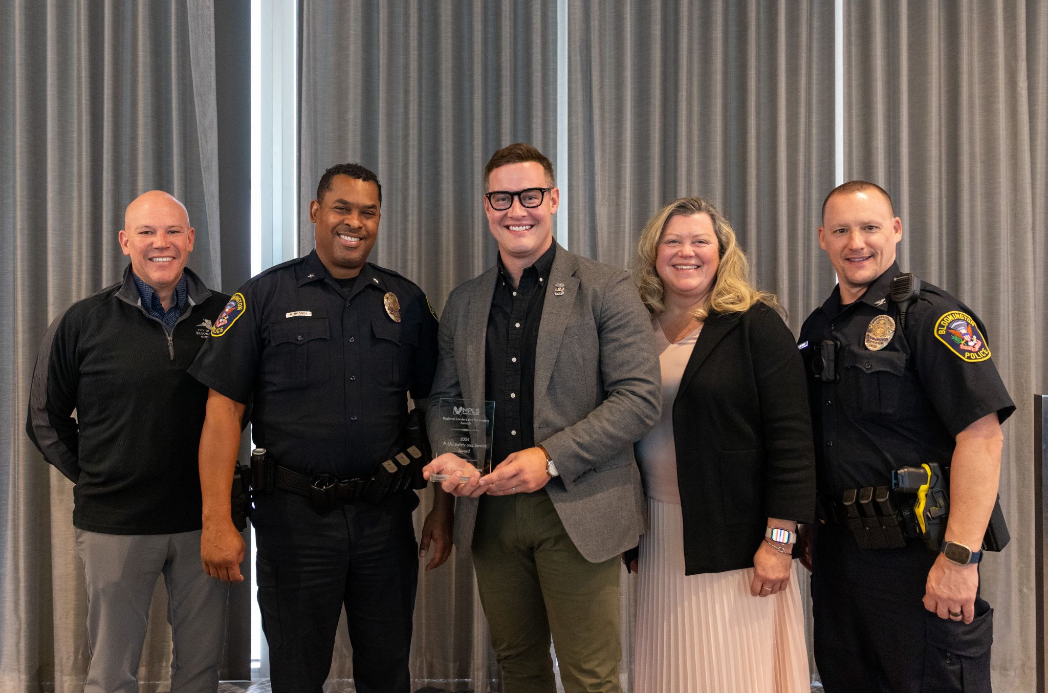 City Manager Jamie Verbrugge, Chief Booker T. Hodges, therapists Luke Campbell and Janet Yeats and Deputy Chief Damon Bitney