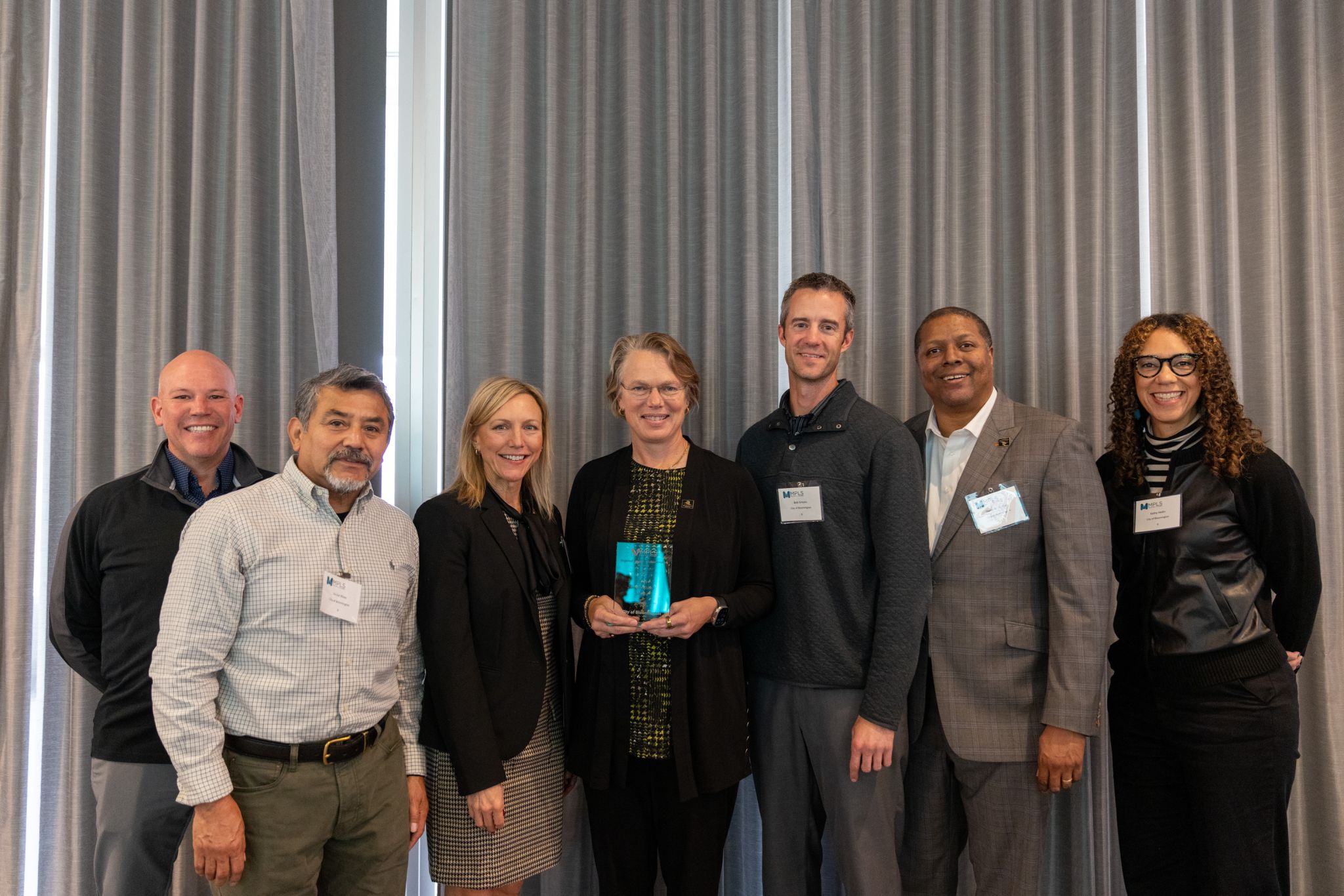 City Manager Jamie Verbrugge, Council Member Victor Rivas, Renae Clark, Ann Kattreh,  Bob Simons, Council Member Dwayne Lowman and Assistant City Manager Kathy Hedin