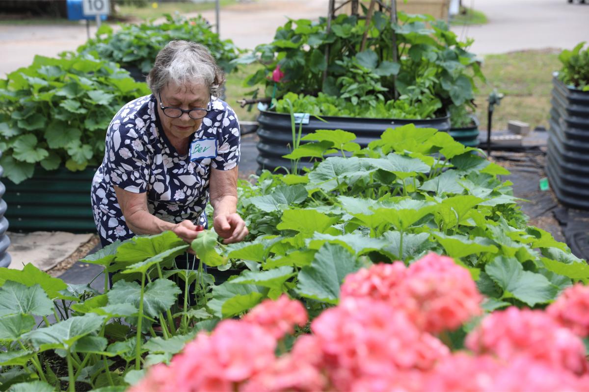 Bev showing off the garden