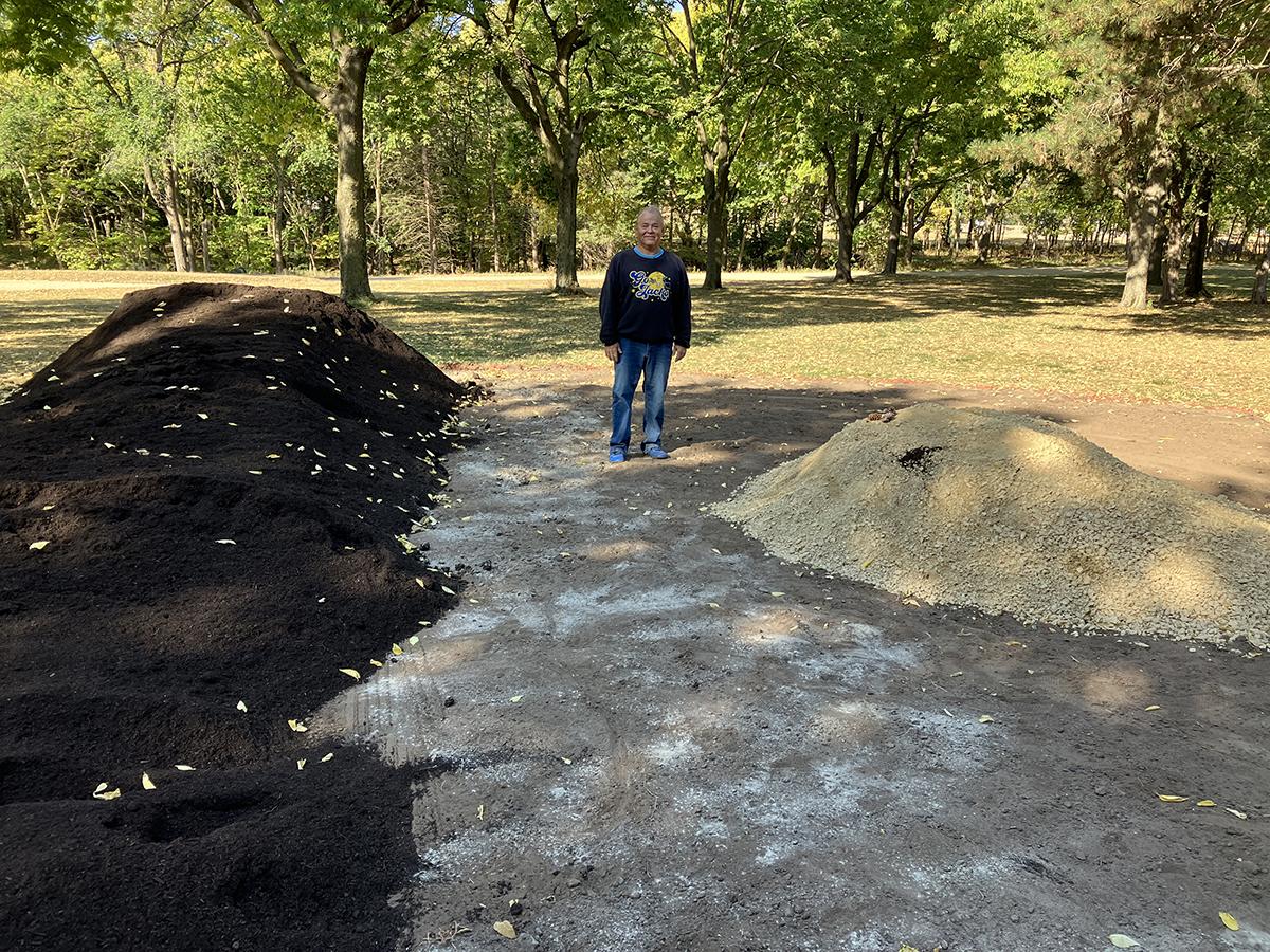 Piles of compost and gravel at the Indigenous Plant Arboretum